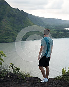 Man Looking out at Crouching Lion Hike on Oahu, Hawaii photo