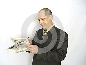Man looking at Paper