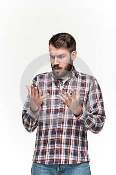 Man is looking scared. Over white background