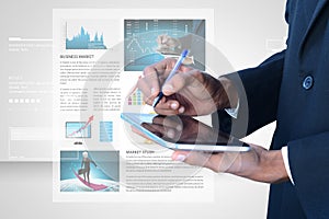 Man looking the stock market chart in tablet computer