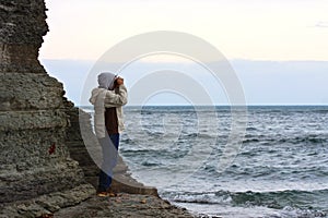 Man Looking at Stormy Sea