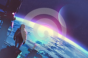 The man looking at a surface of the earth from a space