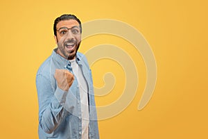 Man looking surprised and pointing to himself