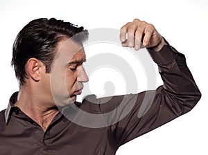 Man looking at sweat stain sweating perspiring