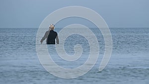 Man looking for treasure in the sea