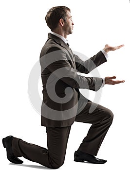 Man looking up in kneeling position