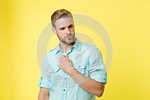 Man looks attractive casual linen blue shirt. Guy bristle undress casual shirt. Fashion concept. Man calm serious face photo