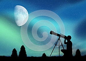 Man looks at the Northern Lights with the telescope