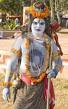 A man in Lord Shiva getup