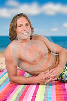 Man lying on the beach