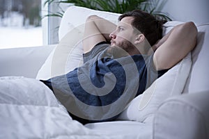 Man lying in bed