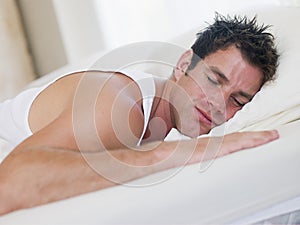 Man lying in bed