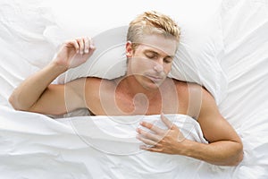 Man lying in bed