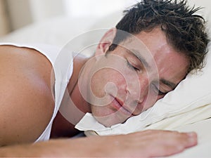 Man lying in bed sleeping