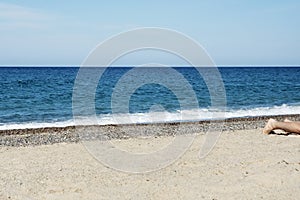 Man lying down on the beach