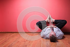 Man lying in the floor