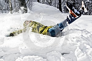 Man lying in snow