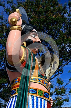 Man with machete statue