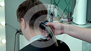 Man machine barbershop young haircut getting adult male salon hairdresser, from professional style for client and