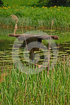 Man Made Bird Nest in the middle of Pond