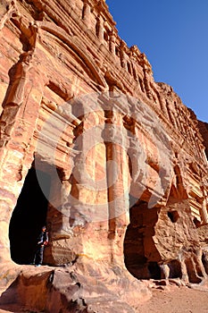 The man-made caves carved in red mountain in Petra - the capital of the Nabatean kingdom in Wadi Musa city at Jordan