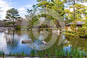 Man made lake in the Japanese garden, Hermann Park, Houston Texas, USA.