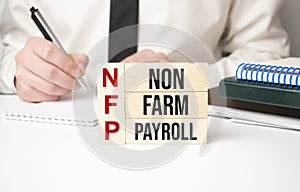 Man made word NFP with wood blocks