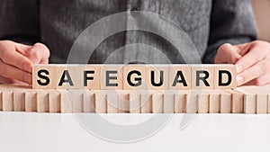 Man made word SAFEGUARD with wood blocks