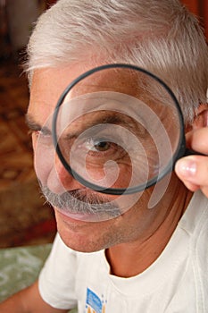 Man and magnifier