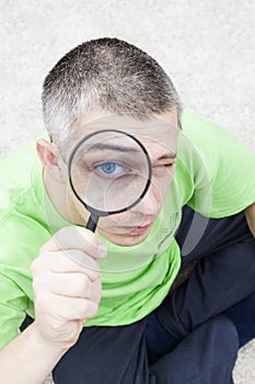 Man with magnify glass