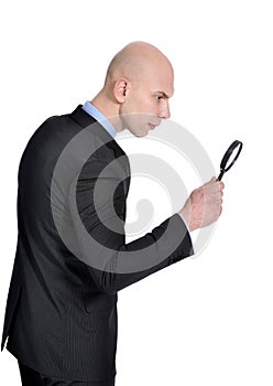 Man with Magnifying Glass searching