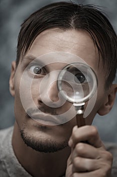 Man with magnifying glass