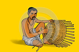 The man is making a bamboo basket photo