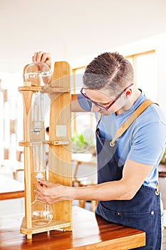 Man making cold brew coffee
