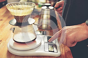 Man making glass of tea