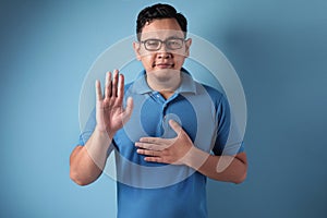 Man Making Pledge Gesture, Hand on Chest, Making Promise