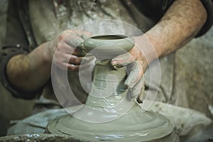 A man making pottery.
