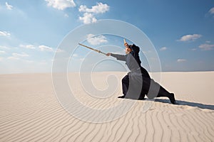 Man is making a powerful lunge with a bamboo sword