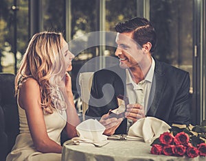 Man making propose to his girlfriend