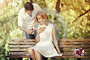 Man making propose to his girlfriend photo