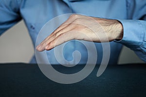 Man making protect gesture.