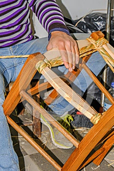 Man making a traditional cypriot chair