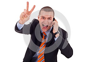 Man making victory sign on phone