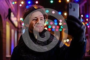 Man making selfie on a cold winter evening