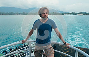 Man male model with beard on the ship in asia