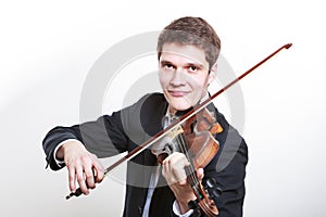 Man man dressed elegantly playing violin