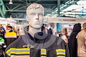 Man mannequin in protective clothes overalls
