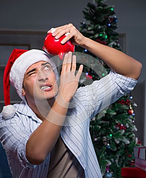 Man with many christmas gifts in boxes