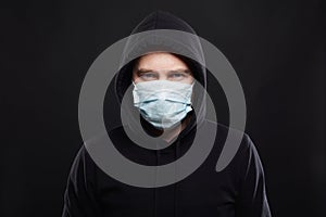 Man in Mask and Hood. Boy in Medicine Mask and Hoodie