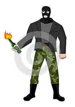 Man in mask with molotov cocktail photo